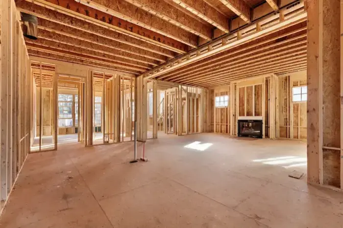 New home construction with fireplace framing